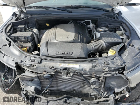 2013 Dodge Durango R/T with VIN 1C4SDHCT2DC559006, listed as a Copart auction lot 49275695 with 117,323 mi miles and Salvage title. Bid and sale history available at DreamBid. Image 13.