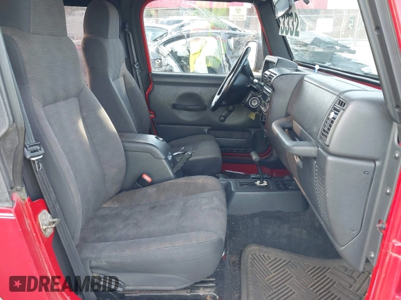 2003 Jeep Wrangler Sport with VIN 1J4FA49S13P320159, listed as a IAAI auction lot 41935699 with 212,355 mi miles. Bid and sale history available at carsss.com. Image 5.