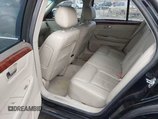 2006 Cadillac DTS w/1SC with VIN 1G6KD57Y96U251691, listed as a IAAI auction lot 41086147 with 128,959 mi miles. Bid and sale history available at carsss.com. Image 8.