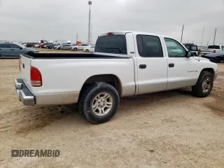 2001 Dodge Dakota Sport z VIN 1B7GL2AN51S118157, wystawiony jako Copart lot #58797325 z przebiegiem 147 765 mil mil oraz Szkoda całkowita • Salvage title. Historia ofert i sprzedaży dostępna na DreamBid. Obrazek 3.