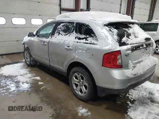 2013 Ford Edge SEL with VIN 2FMDK3JC4DBC69821, listed as a IAAI auction lot 41345936 with 194,886 mi miles. Bid and sale history available at carsss.com. Image 3.