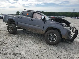 2017 Toyota Tacoma SR5 with VIN 5TFCZ5AN6HX083463, listed as a Copart auction lot 61348895 with 102,927 mi miles and Salvage title. Bid and sale history available at DreamBid. Image 4.