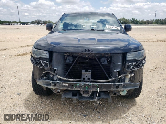 2016 Jeep Grand Cherokee Overland z VIN 1C4RJFCG8GC316271, wystawiony jako Copart lot #57245065 z przebiegiem 125 820 mil mil oraz Szkoda całkowita • Salvage title. Historia ofert i sprzedaży dostępna na DreamBid. Obrazek 5.