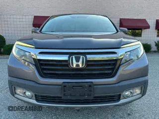 2019 Honda Ridgeline RTL-E with VIN 5FPYK3F71KB009532, listed as a Copart auction lot 65827935 with 217,177 mi miles and Clean title. Bid and sale history available at DreamBid. Image 13.
