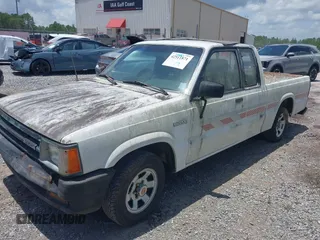 1991 Mazda B-Series Truck z VIN JM2UF3133M0169084, wystawiony jako IAAI lot #42511871 z przebiegiem 175 426 mil mil oraz . Historia ofert i sprzedaży dostępna na DreamBid. Obrazek 6.