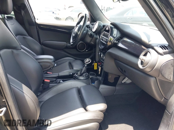 2015 MINI Hardtop 4 Door S with VIN WMWXU3C58F2B66601, listed as a IAAI auction lot 42444404 with 76,174 mi miles and . Bid and sale history available at DreamBid. Image 5.