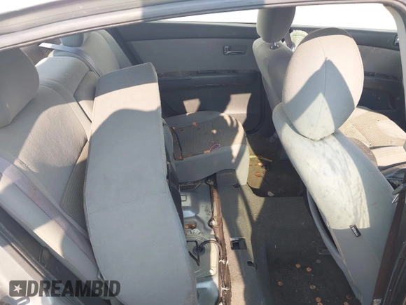 2011 Nissan Sentra 2.0 z VIN 3N1AB6AP4BL718463, wystawiony jako IAAI lot #42395134 z przebiegiem 174 302 mil mil oraz . Historia ofert i sprzedaży dostępna na DreamBid. Obrazek 8.