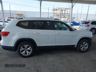 2018 Volkswagen Atlas SE with VIN 1V2CR2CAXJC594811, listed as a IAAI auction lot 42408595 with 65,247 mi miles and . Bid and sale history available at DreamBid. Image 14.