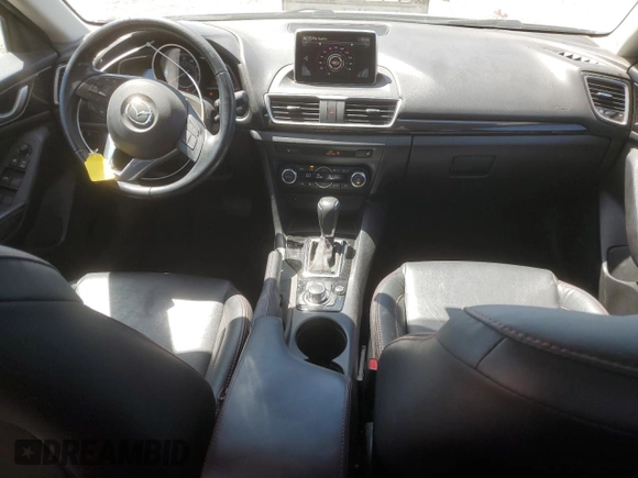 2015 Mazda 3 i Grand Touring z VIN 3MZBM1M72FM145070, wystawiony jako Copart lot #58419525 z przebiegiem 61 255 mil mil oraz Szkoda całkowita • Salvage title. Historia ofert i sprzedaży dostępna na DreamBid. Obrazek 8.