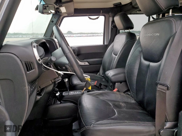 2014 Jeep Wrangler Unlimited Rubicon с VIN 1C4HJWFG3EL322449, выставлен на аукционе Copart как лот 57187665 с пробегом 122 469 миль миль и Списание • Salvage title. История ставок и продаж доступна на DreamBid. Изображение 7.