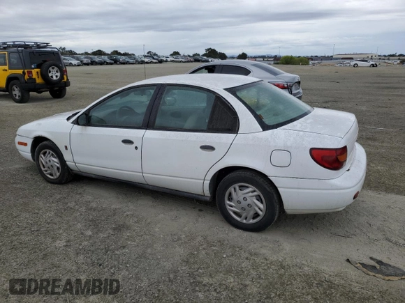 2001 Saturn SL with VIN 1G8ZF52891Z237485, listed as a Copart auction lot 76174574 with 130,525 mi miles and Salvage title. Bid and sale history available at DreamBid. Image 2.