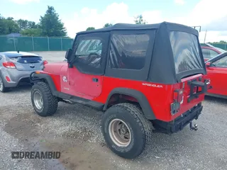 1991 Jeep Wrangler with VIN 2J4FY19P7MJ132895, listed as a IAAI auction lot 42541973 with 169,999 mi miles and . Bid and sale history available at DreamBid. Image 3.