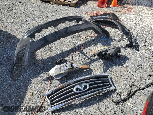 2013 Infiniti FX with VIN JN8CS1MU0DM140661, listed as a Copart auction lot 56652205 with Not provided miles and Salvage title. Bid and sale history available at DreamBid. Image 13.