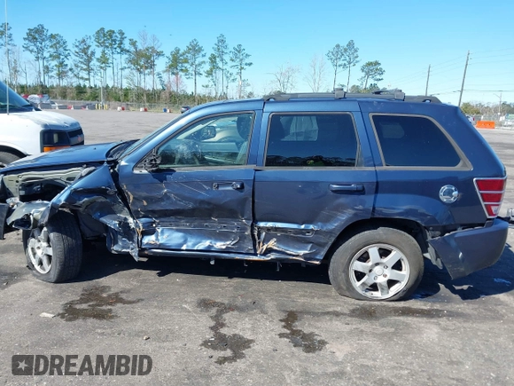 2009 Jeep Grand Cherokee Laredo with VIN 1J8HR48P19C540785, listed as a IAAI auction lot 41729851 with 205,504 mi miles. Bid and sale history available at carsss.com. Image 14.