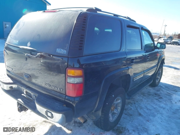 2001 Chevrolet Tahoe LS with VIN 1GNEK13T01J116989, listed as a IAAI auction lot 41871390 with 265,541 mi miles. Bid and sale history available at carsss.com. Image 4.