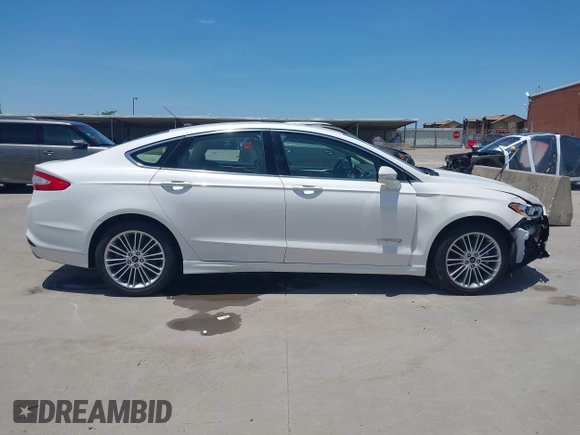 2014 Ford Fusion SE Hybrid with VIN 3FA6P0LUXER233658, listed as a IAAI auction lot 42311588 with 106,282 mi miles and . Bid and sale history available at DreamBid. Image 13.