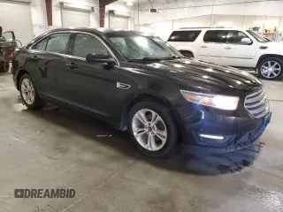 2014 Ford Taurus SEL z VIN 1FAHP2E82EG186640, wystawiony jako Copart lot #55820205 z przebiegiem 194 843 mil mil oraz Czysty tytuł • Clean title. Historia ofert i sprzedaży dostępna na DreamBid. Obrazek 4.