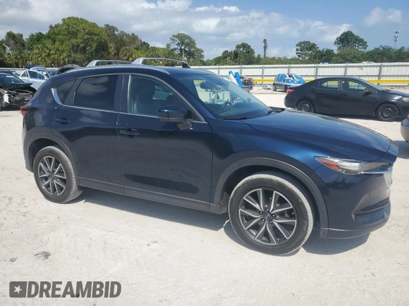 2018 Mazda CX-5 Touring with VIN JM3KFACM5J0419207, listed as a Copart auction lot 51123855 with 75,831 mi miles and Salvage Title. Bid and sale history available at carsss.com. Image 4.