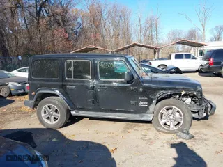 2020 Jeep Wrangler Unlimited North Edition with VIN 1C4HJXEN2LW221842, listed as a IAAI auction lot 41030002 with 86,576 mi miles. Bid and sale history available at carsss.com. Image 14.