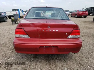 2002 Mitsubishi Lancer ES with VIN JA3AJ26E52U038172, listed as a Copart auction lot 66434354 with Not Provided miles and Clean Title. Bid and sale history available at carsss.com. Image 6.