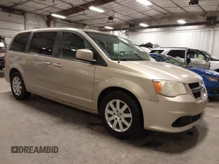 2013 Dodge Grand Caravan SXT with VIN 2C4RDGCG0DR567186, listed as a IAAI auction lot 41706119 with 112,512 mi miles and . Bid and sale history available at DreamBid. Image 1.