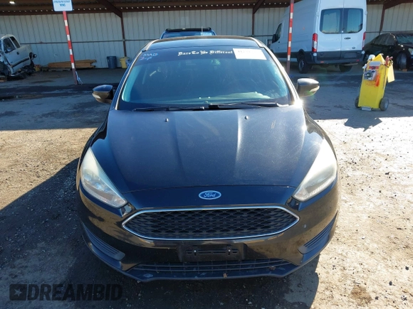 2015 Ford Focus SE with VIN 1FADP3F21FL262033, listed as a IAAI auction lot 41521714 with 101,890 mi miles. Bid and sale history available at carsss.com. Image 12.