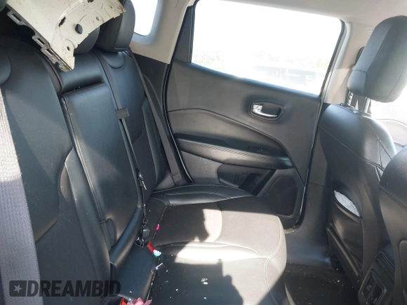 2021 Jeep Compass Altitude with VIN 3C4NJDBB2MT596181, listed as a IAAI auction lot 42026716 with 69,526 mi miles and . Bid and sale history available at DreamBid. Image 8.