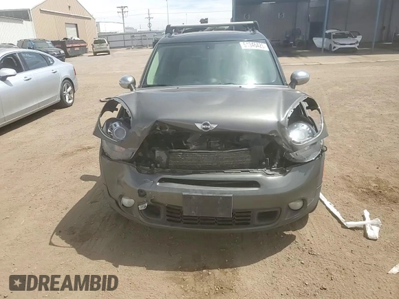 2013 MINI Countryman S ALL4 z VIN WMWZC5C56DWM16203, wystawiony jako Copart lot #54346425 z przebiegiem 148 065 mil mil oraz Szkoda całkowita • Salvage title. Historia ofert i sprzedaży dostępna na DreamBid. Obrazek 13.