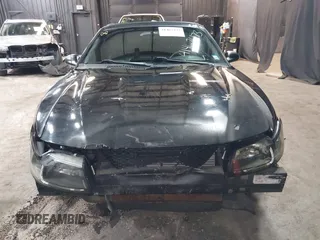 2000 Ford Mustang with VIN 1FAFP4448YF214730, listed as a IAAI auction lot 41467473 with 114,910 mi miles. Bid and sale history available at carsss.com. Image 12.