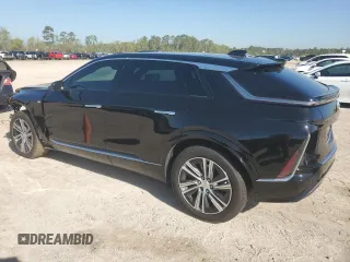 2024 Cadillac LYRIQ Luxury z VIN 1GYKPPRK1RZ137520, wystawiony jako Copart lot #50578095 z przebiegiem 6815 mil mil oraz Szkody całkowita. Historia ofert i sprzedaży dostępna na DreamBid. Obrazek 2.