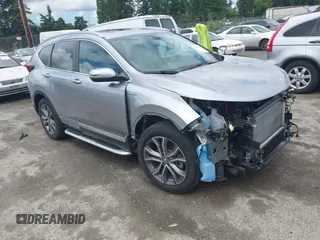 2021 Honda CR-V Touring with VIN 7FART6H9XME011488, listed as a IAAI auction lot 42361239 with 15,139 mi miles and . Bid and sale history available at DreamBid. Image 1.