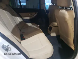 2018 BMW 3 Series 320i xDrive с VIN WBA8E5G51JNV02570, выставлен на аукционе Copart как лот 49970335 с пробегом 78 819 миль миль и Списание • Salvage title. История ставок и продаж доступна на DreamBid. Изображение 10.
