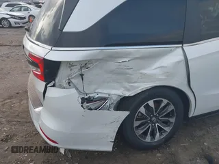 2022 Honda Odyssey EX-L with VIN 5FNRL6H77NB032262, listed as a IAAI auction lot 40772227 with 35,053 mi miles and . Bid and sale history available at DreamBid. Image 6.