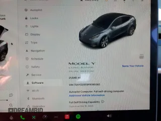 2023 Tesla Model Y Long Range with VIN 7SAYGDEE9PA180293, listed as a Copart auction lot 89062695 with 21,648 mi miles and Salvage Title. Bid and sale history available at DreamBid. Image 9.