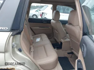 2003 Subaru Forester XS with VIN JF1SG65683H734188, listed as a IAAI auction lot 41584619 with 242,536 mi miles. Bid and sale history available at carsss.com. Image 8.