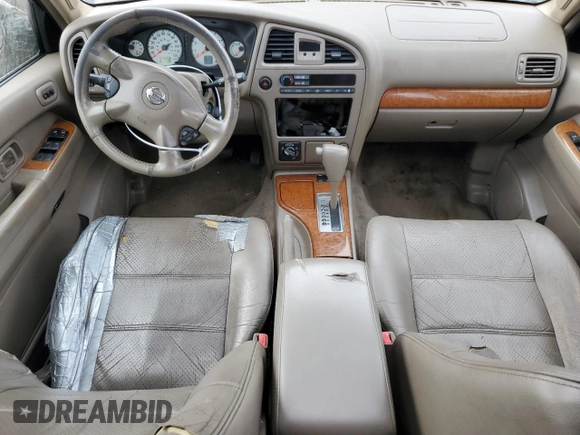 2003 Nissan Pathfinder LE z VIN JN8DR09Y63W835297, wystawiony jako Copart lot #76980904 z przebiegiem 254 778 mil mil oraz Szkoda całkowita • Salvage title. Historia ofert i sprzedaży dostępna na DreamBid. Obrazek 8.