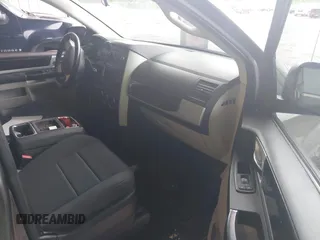 2010 Dodge Grand Caravan SXT z VIN 2D4RN5D11AR220105, wystawiony jako IAAI lot #42299610 z przebiegiem 223 842 mil mil oraz . Historia ofert i sprzedaży dostępna na DreamBid. Obrazek 5.