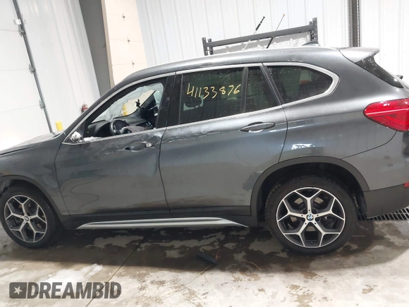 2018 BMW X1 xDrive28i with VIN WBXHT3C38J5L34625, listed as a IAAI auction lot 41133876 with 60,986 mi miles and . Bid and sale history available at DreamBid. Image 14.