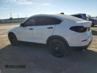 2015 BMW X4 xDrive28i with VIN 5UXXW3C57F0M88974, listed as a Copart auction lot 36212923 with 138,948 mi miles. Bid and sale history available at carsss.com. Image 2.