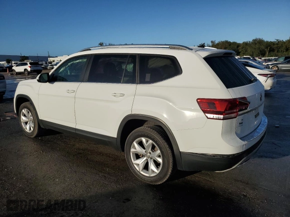 2019 Volkswagen Atlas SE with VIN 1V2DP2CA9KC595931, listed as a Copart auction lot 84701994 with 77,000 mi miles and Salvage title. Bid and sale history available at DreamBid. Image 2.