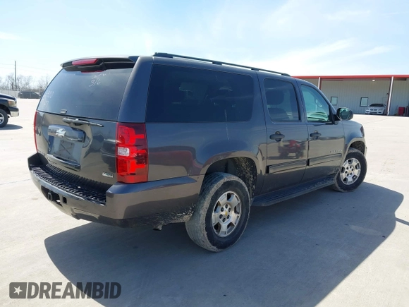 2010 Chevrolet Suburban LS z VIN 1GNUKHE36AR207087, wystawiony jako IAAI lot #41729820 z przebiegiem 266 177 mil mil oraz . Historia ofert i sprzedaży dostępna na DreamBid. Obrazek 4.