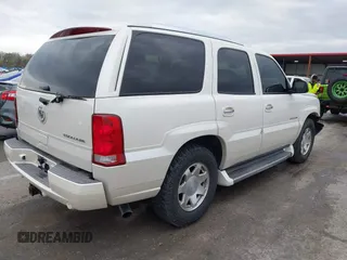 2005 Cadillac Escalade z VIN 1GYEK63N25R190908, wystawiony jako IAAI lot #41882135 z przebiegiem 243 333 mil mil oraz . Historia ofert i sprzedaży dostępna na DreamBid. Obrazek 4.