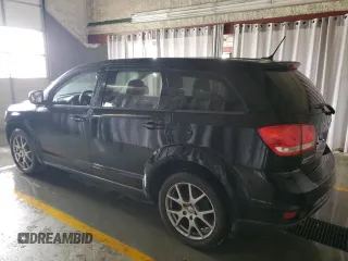 2015 Dodge Journey R/T with VIN 3C4PDDEG7FT749387, listed as a Copart auction lot 52973235 with 127,753 mi miles and Clean Title. Bid and sale history available at DreamBid. Image 2.