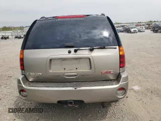 2003 GMC Envoy SLE z VIN 1GKDT13S332365071, wystawiony jako Copart lot #52811295 z przebiegiem Nie podano mil oraz Szkoda całkowita • Salvage title. Historia ofert i sprzedaży dostępna na DreamBid. Obrazek 6.