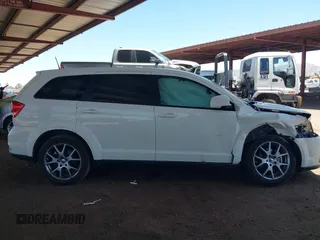 2019 Dodge Journey GT z VIN 3C4PDDEG8KT751689, wystawiony jako IAAI lot #42552869 z przebiegiem 131 066 mil mil oraz . Historia ofert i sprzedaży dostępna na DreamBid. Obrazek 13.