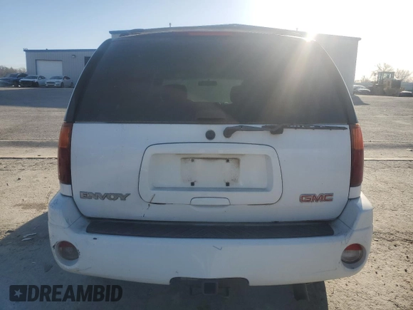2004 GMC Envoy SLE with VIN 1GKDT13S842326946, listed as a Copart auction lot 47276955 with 162,141 mi miles and Clean Title. Bid and sale history available at carsss.com. Image 6.