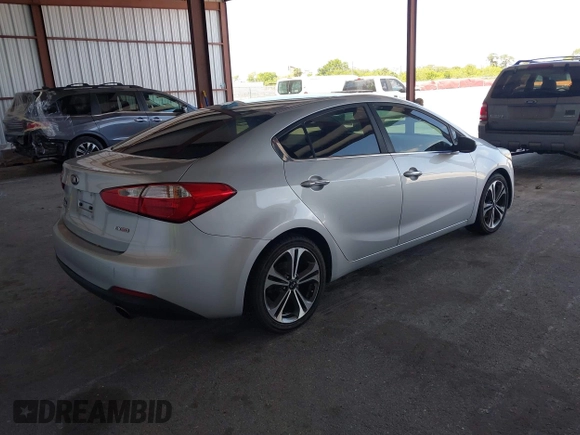 2016 Kia Forte EX with VIN KNAFX4A81G5528190, listed as a IAAI auction lot 42142075 with 162,056 mi miles. Bid and sale history available at carsss.com. Image 4.