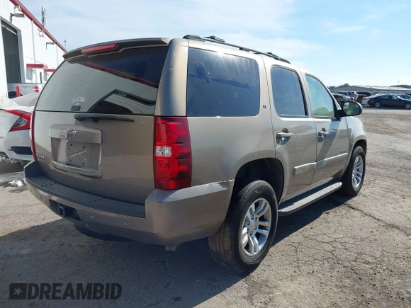 2007 Chevrolet Tahoe LS with VIN 1GNFC13J57R183484, listed as a IAAI auction lot 40837034 with Not provided miles and . Bid and sale history available at DreamBid. Image 4.