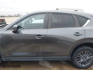 2021 Mazda CX-5 Touring with VIN JM3KFBCM0M0342210, listed as a IAAI auction lot 41236013 with 96,012 mi miles. Bid and sale history available at carsss.com. Image 15.