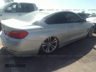 2015 BMW 4 Series 428i z VIN WBA3N7C50FK223504, wystawiony jako IAAI lot #39593317 z przebiegiem 64 668 mil mil oraz . Historia ofert i sprzedaży dostępna na DreamBid. Obrazek 4.
